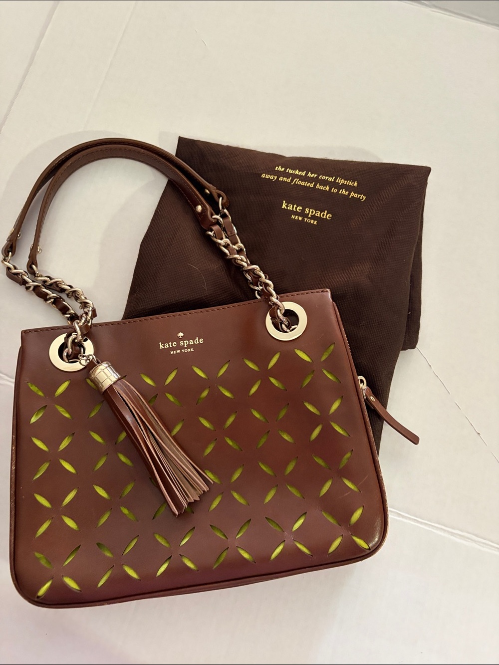 kate spade brown leather shoulder bag with green underlay and tassel